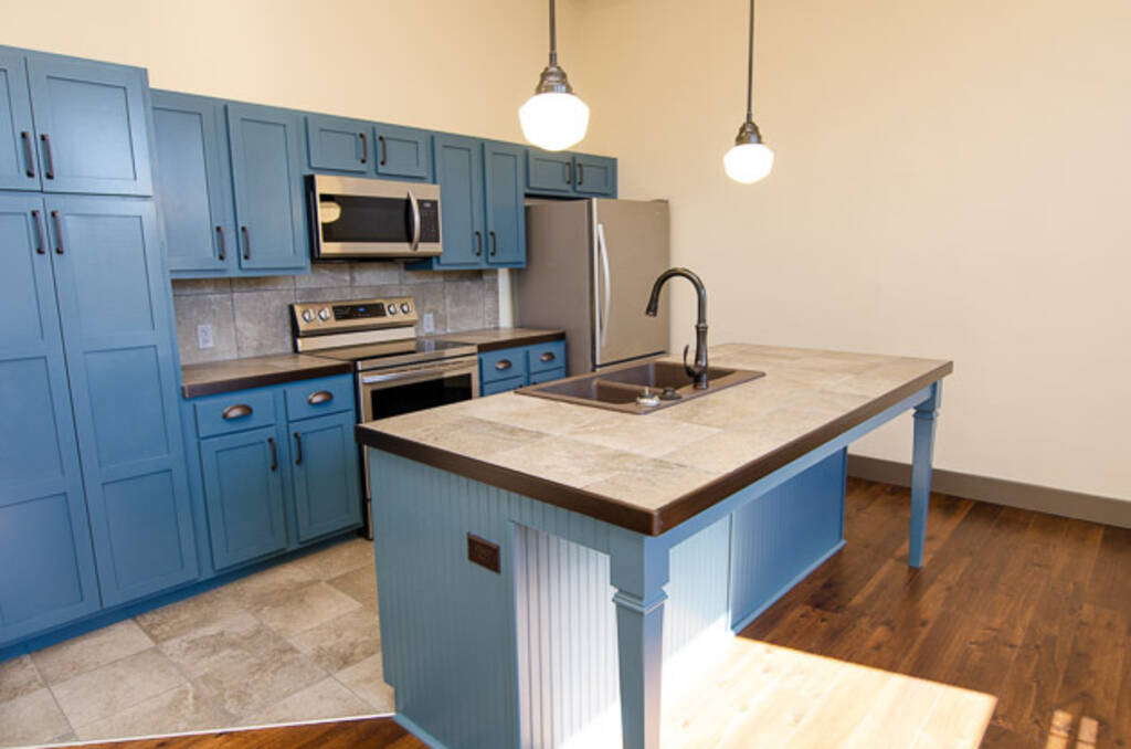 Loft 2D blue cabinets with blue island left side view 