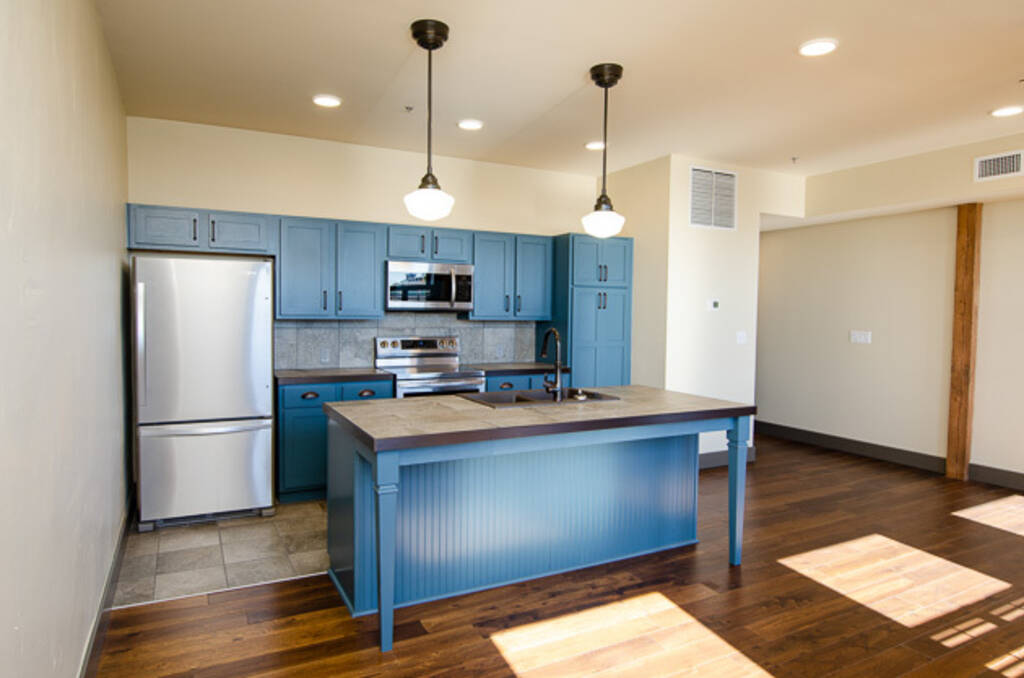 LOFT 3D KITCHEN WITH BLUE ISLAND AND BLUE CABINETS FROM THE LEFT