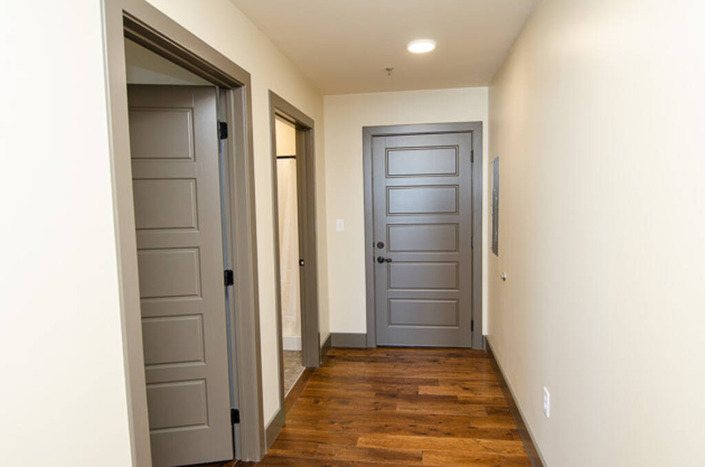 LOFT 3D HALLWAY VIEW WITH BEDROOM AND BATHROOM DOORS 
