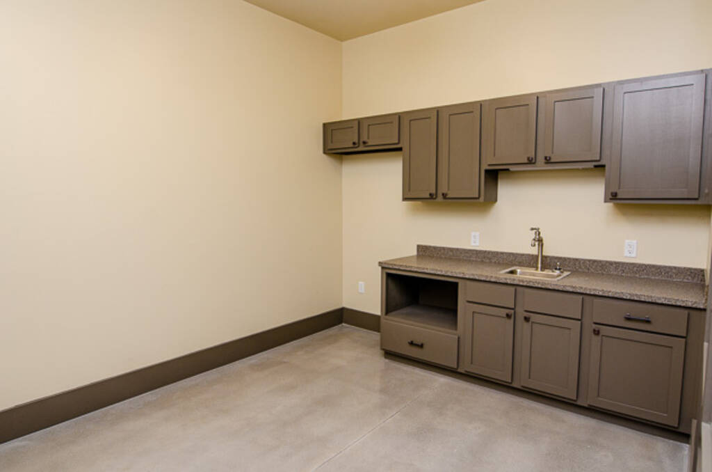 Suite B View of Sink and Brown Cabinets in Breakroom 