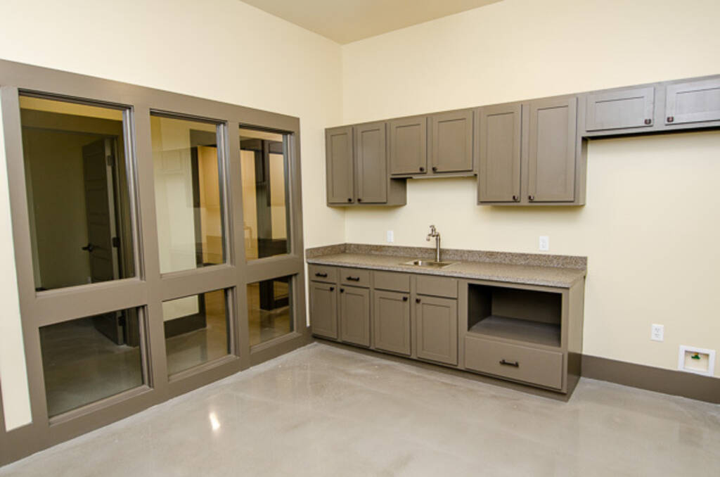 Suite C View of Sink and Grey Cabinets in Breakroom